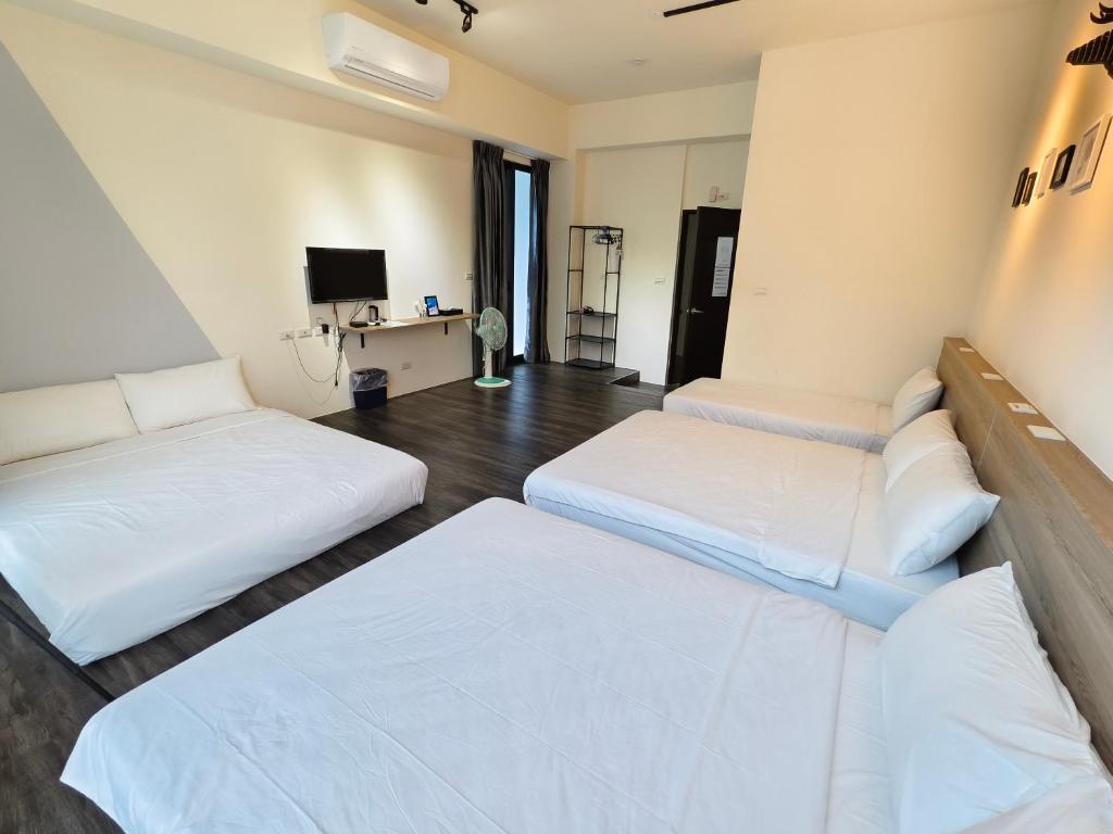 Postel nebo postele na pokoji v ubytování Little Butler B&B