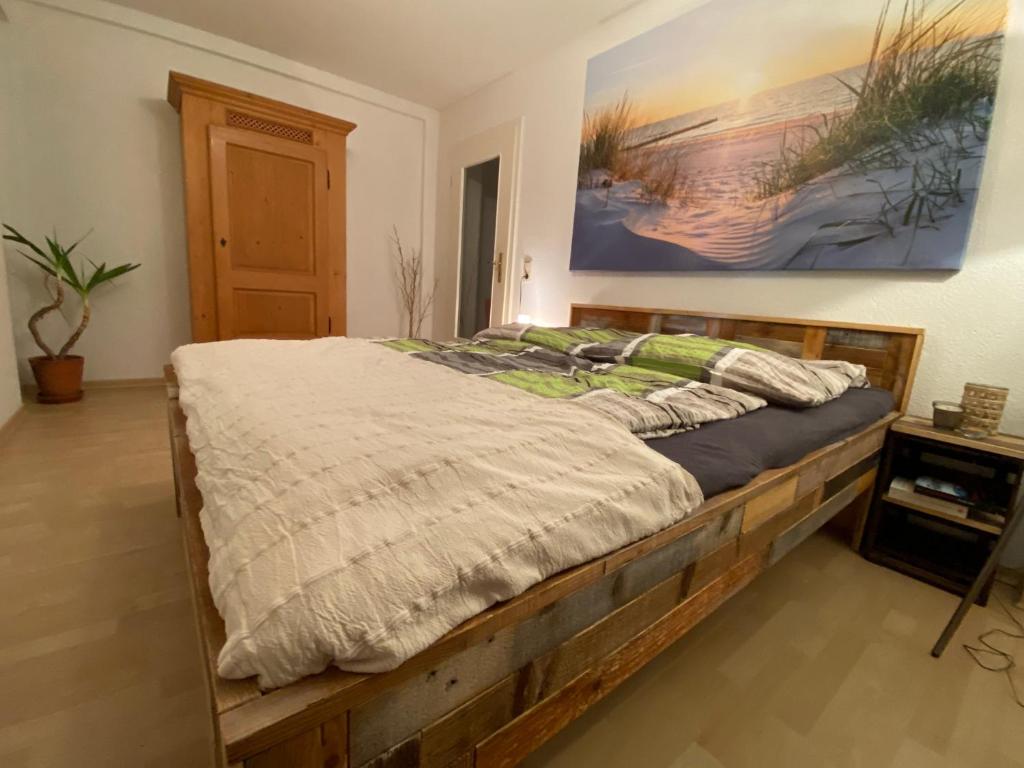 En eller flere senge i et værelse på Große Kutscherwohnung
