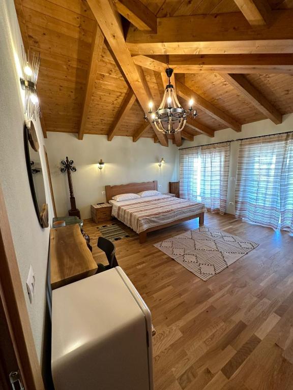 Postel nebo postele na pokoji v ubytování Guesthouse Marku - Mrizi i Zanave