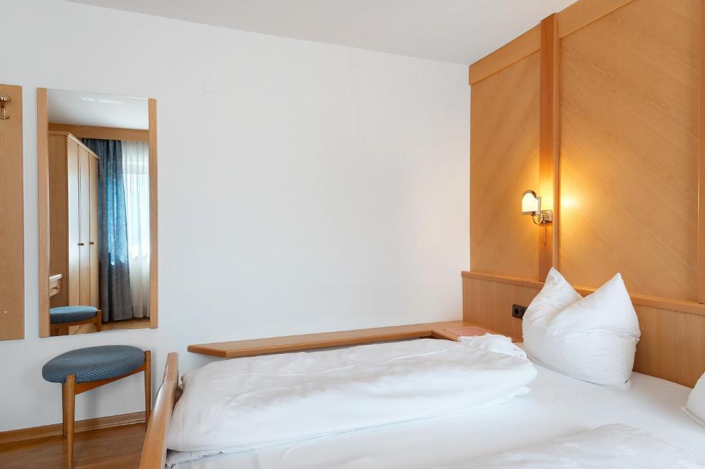Postel nebo postele na pokoji v ubytování Mayr Apartments Fünf