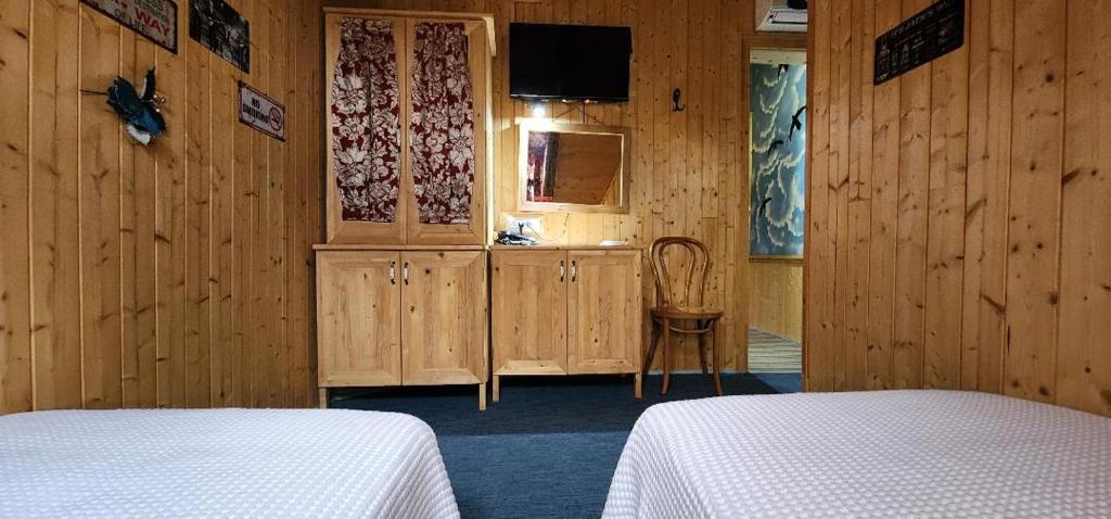 Postel nebo postele na pokoji v ubytování Hotel London