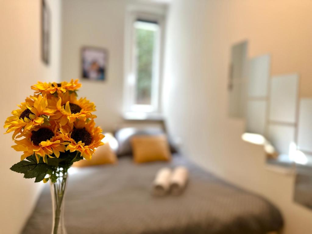 Postel nebo postele na pokoji v ubytování MMRent Hill Room