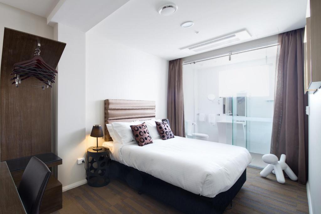 Postel nebo postele na pokoji v ubytování 57Hotel