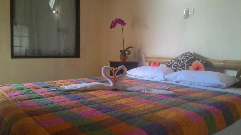 Cama o camas de una habitación en Tunjung Guest House