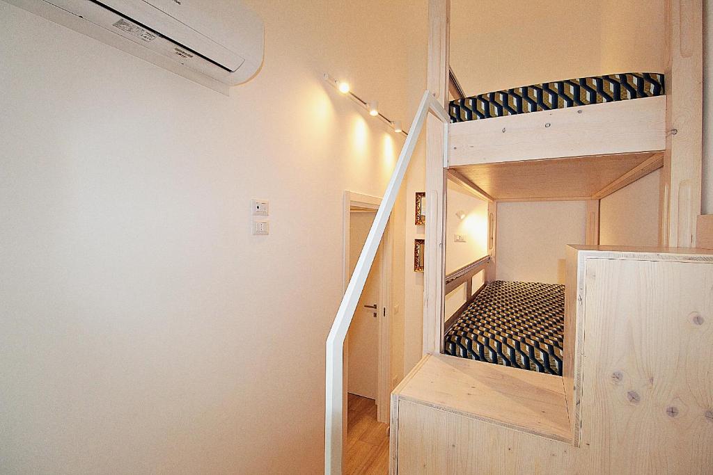 Łóżko lub łóżka w pokoju w obiekcie Casa Vacanze del Vicario