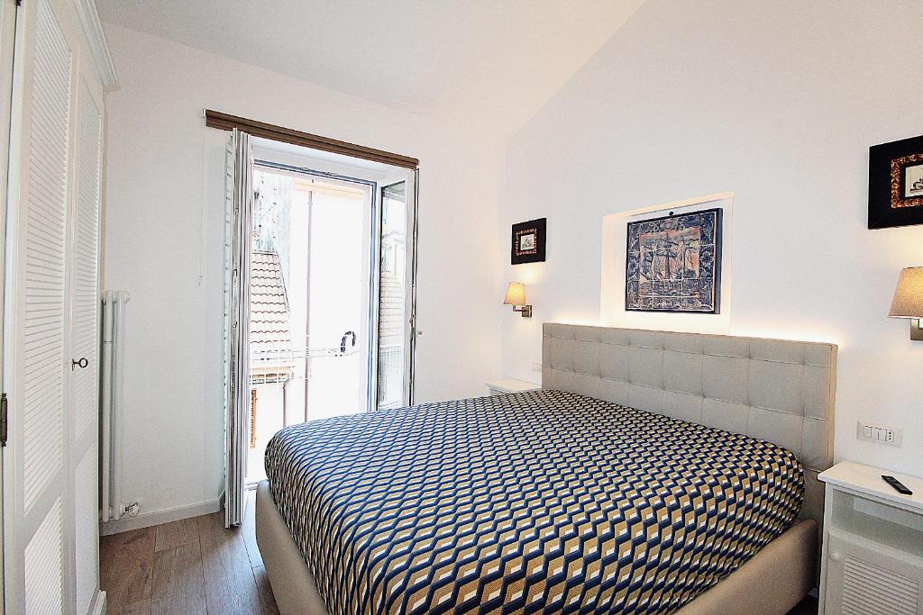 Łóżko lub łóżka w pokoju w obiekcie Casa Vacanze del Vicario