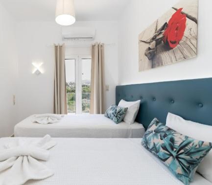 Ένα ή περισσότερα κρεβάτια σε δωμάτιο στο Olive Grove Apartment