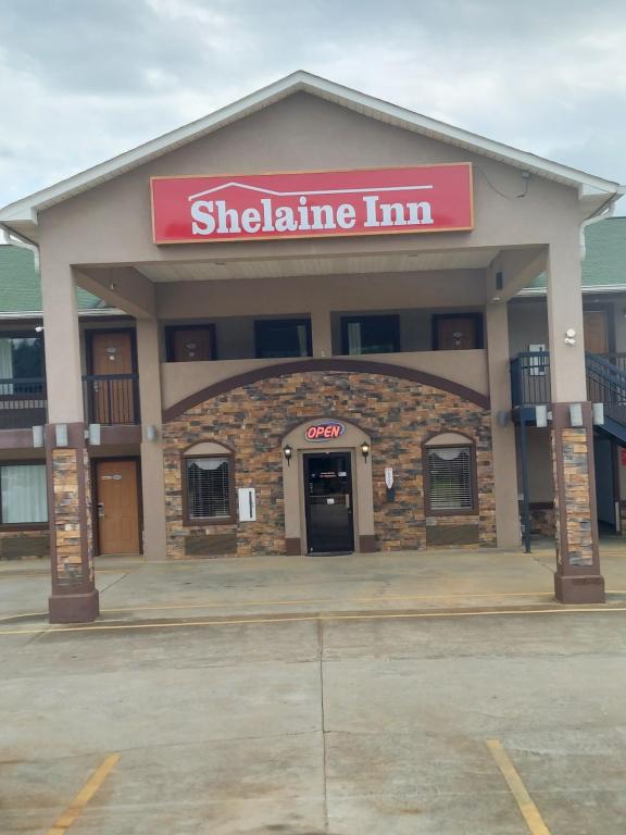 a shalahine inn sign in front of a building at Shelaine Inn in Jeffersonville