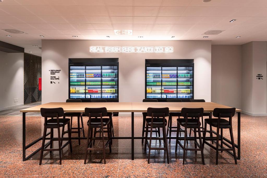 A área empresarial e/ ou a sala de conferências de Quark Hotel Milano