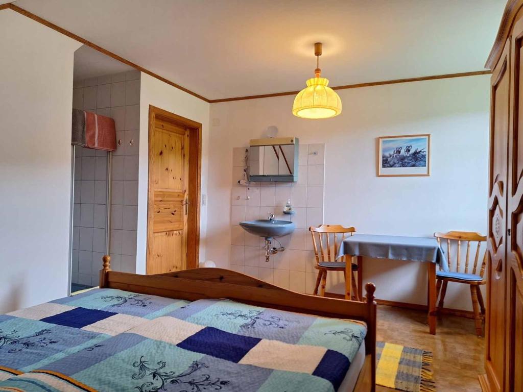 Postel nebo postele na pokoji v ubytování Haus Oberfeichtner