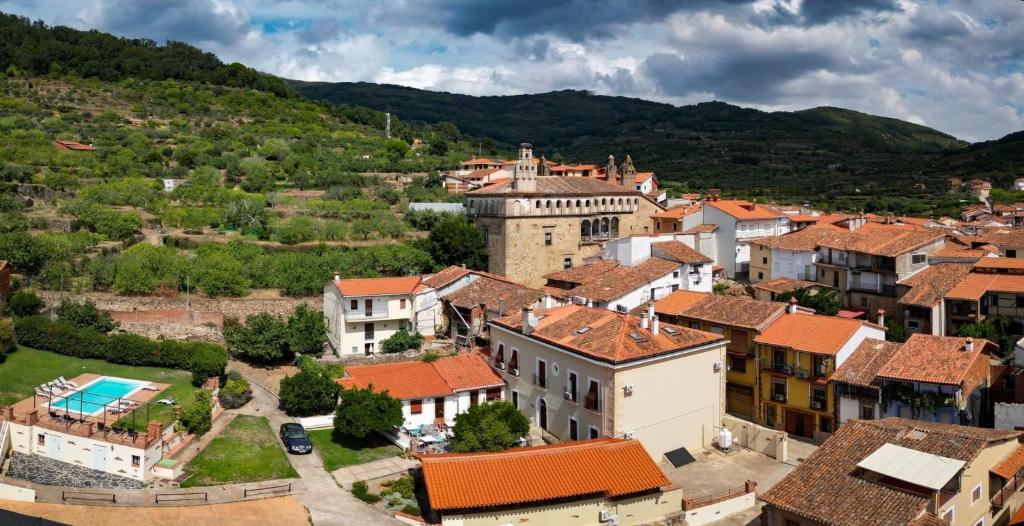 an aerial view of a small town with houses at Hotel Rural La Casa De Pasarón in Pasarón