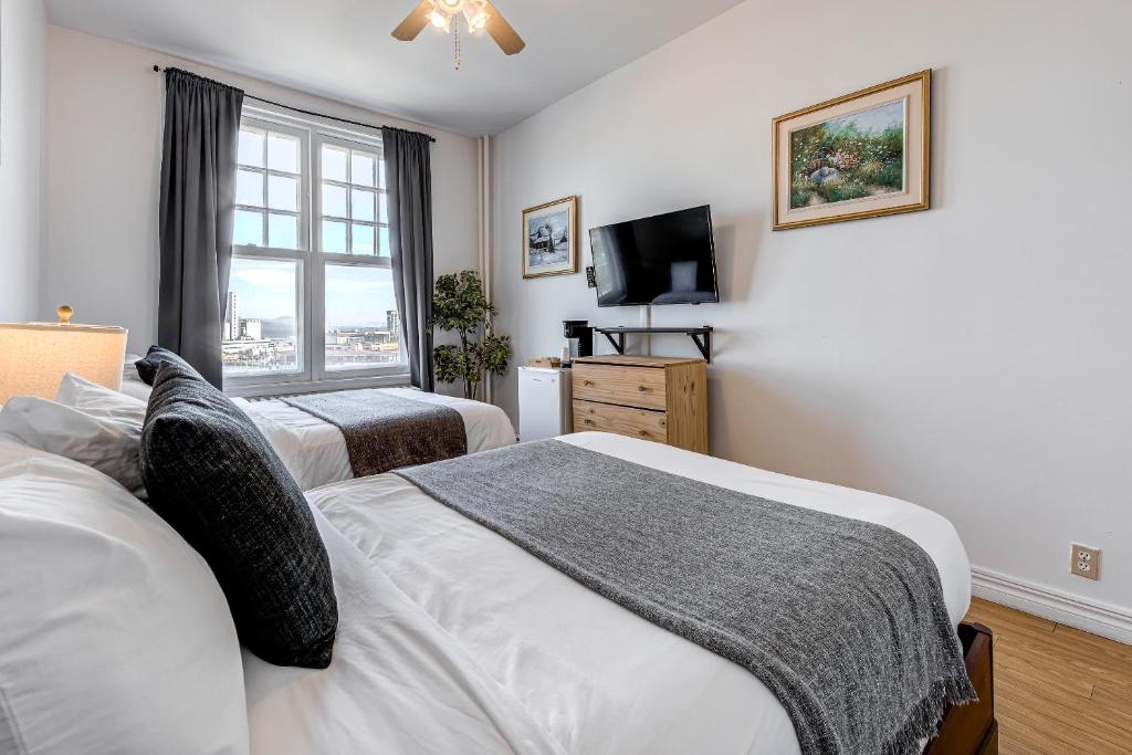 North House - Hôtel Automatisé Manoir des Remparts - Resim 36