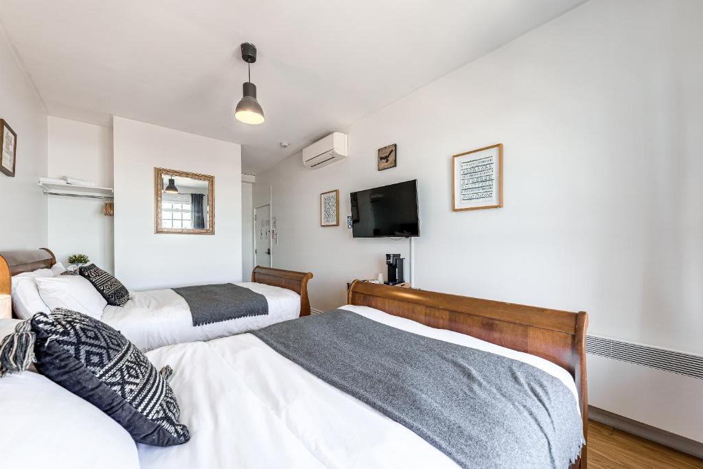 North House - Hôtel Automatisé Manoir des Remparts - Resim 23