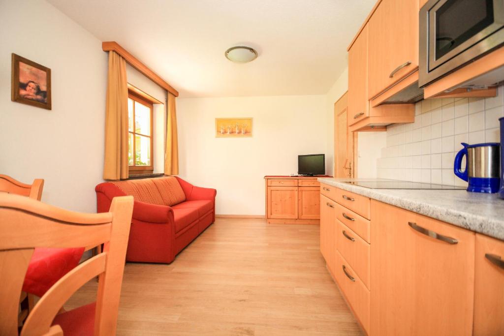 Kuchyň nebo kuchyňský kout v ubytování Alpinchalet Ortler