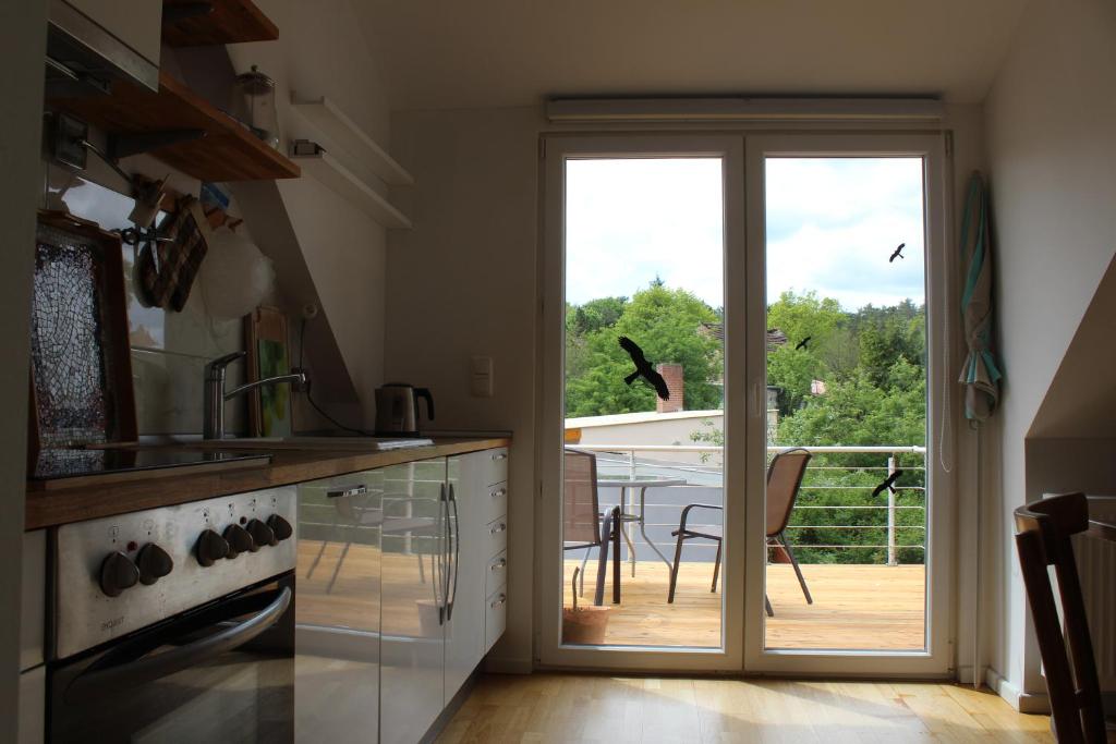 Kuchyň nebo kuchyňský kout v ubytování Ferienwohnung am Teupitzsee