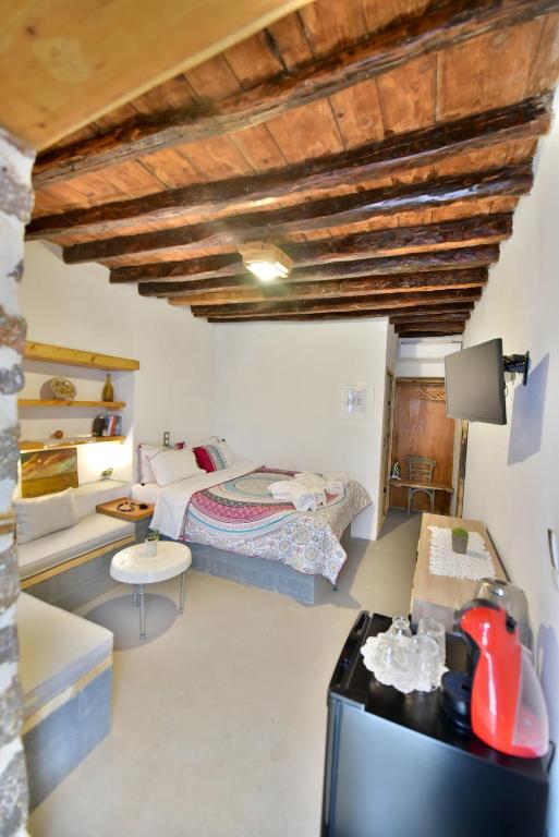 Postel nebo postele na pokoji v ubytování Mastoris Mansion