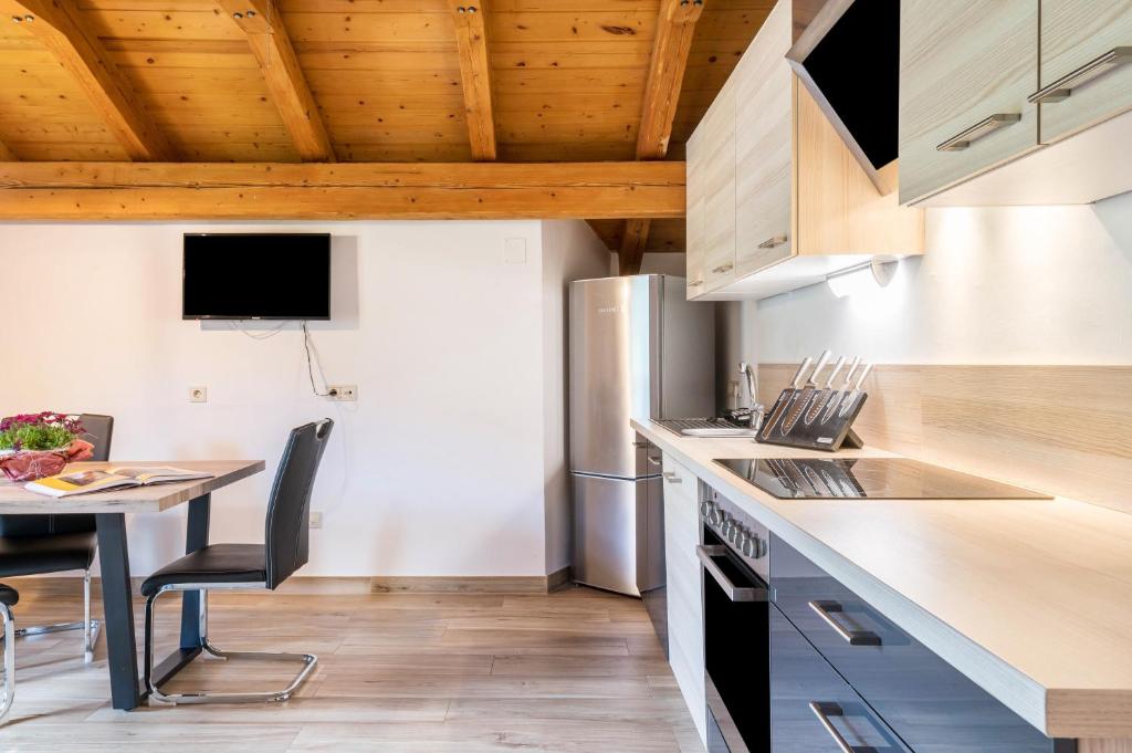 Kuchyň nebo kuchyňský kout v ubytování Stofnerhof Wohnung Neu