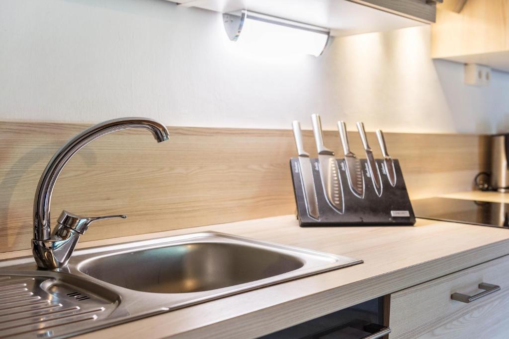 Kuchyň nebo kuchyňský kout v ubytování Stofnerhof Wohnung Neu