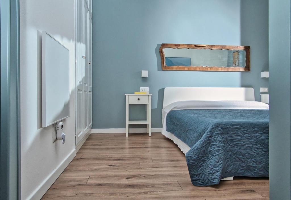 Postel nebo postele na pokoji v ubytování Suite In Piazzetta