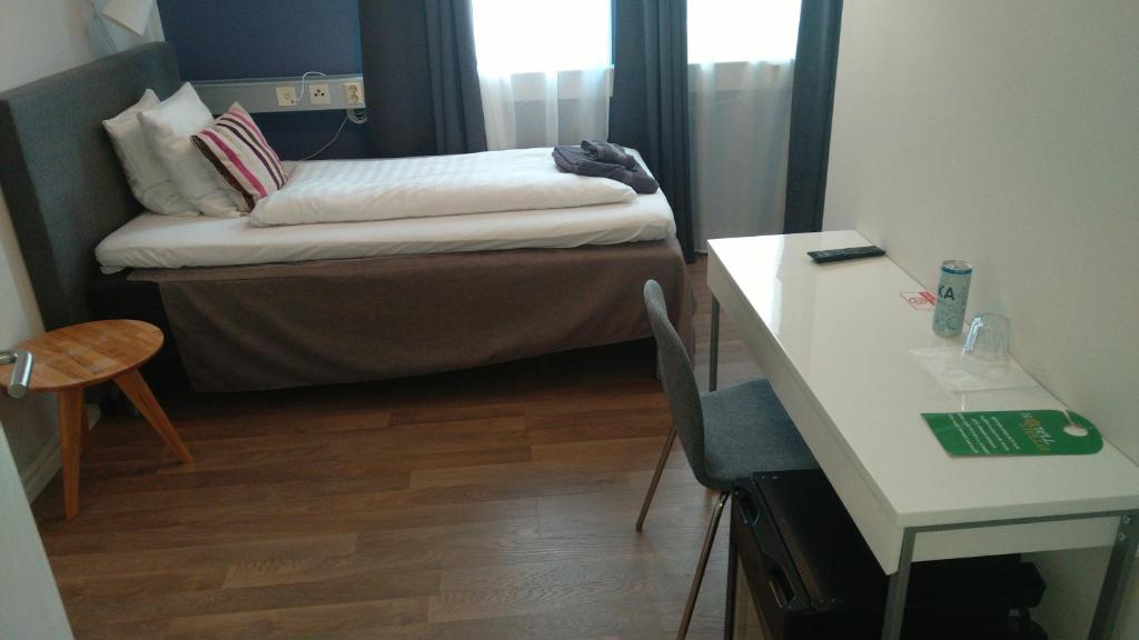 Postel nebo postele na pokoji v ubytování Hotel Charlotte / Stella