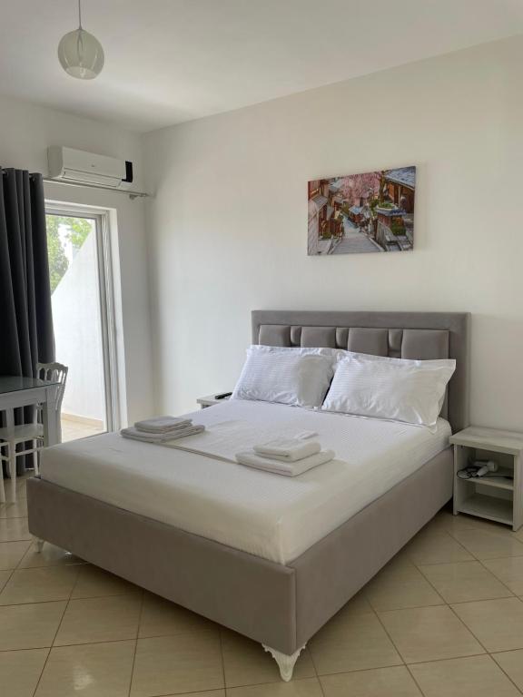 Posteľ alebo postele v izbe v ubytovaní Joni Apartments