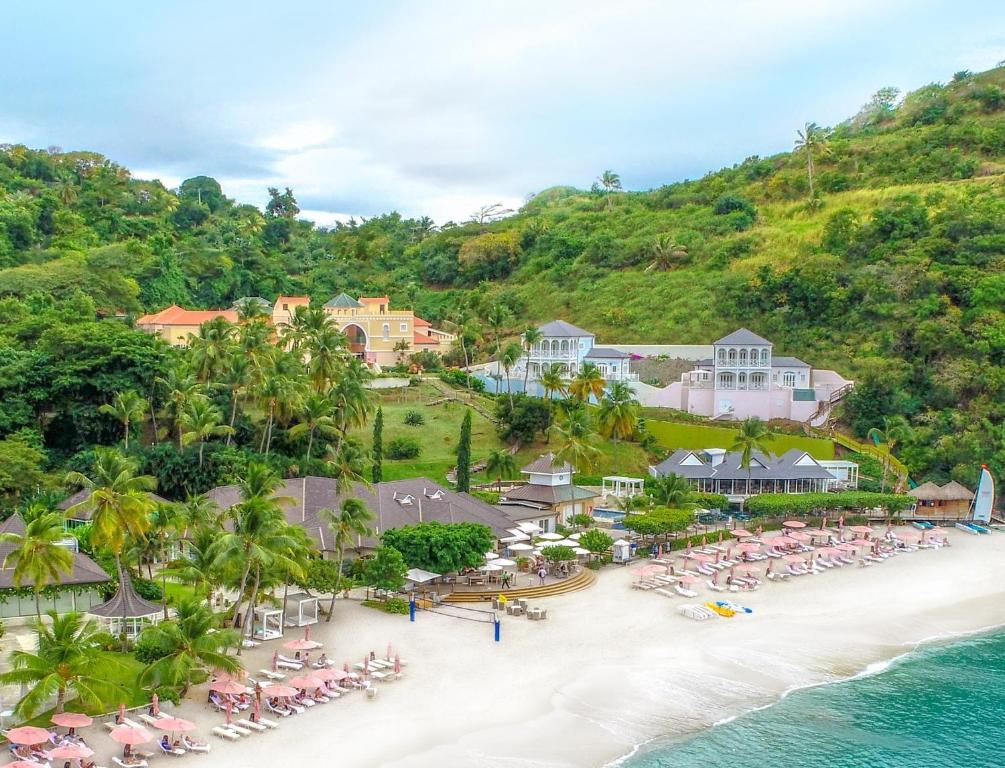 an aerial view of the beach at a resort at BodyHoliday St Lucia in Gros Islet