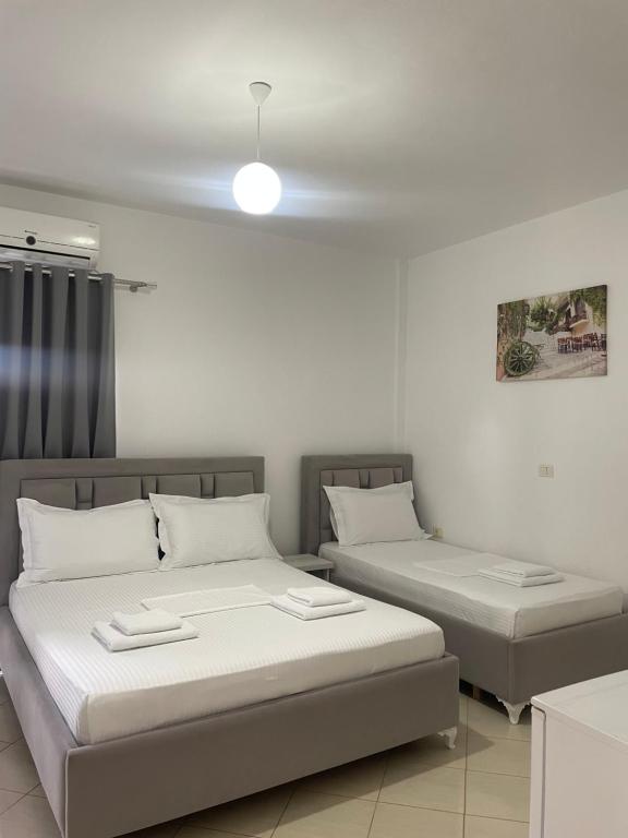 Posteľ alebo postele v izbe v ubytovaní Joni Apartments