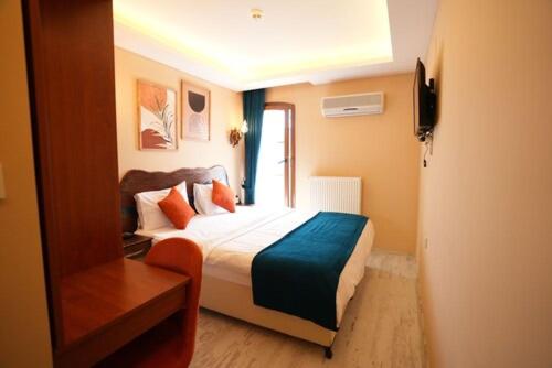 En eller flere senge i et værelse på CastaDiva