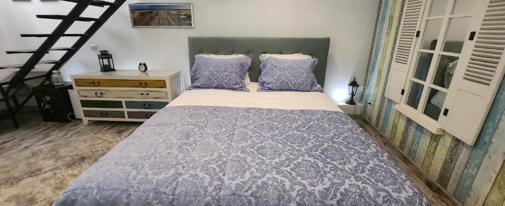 Postel nebo postele na pokoji v ubytování Morii Lake Pool Villa