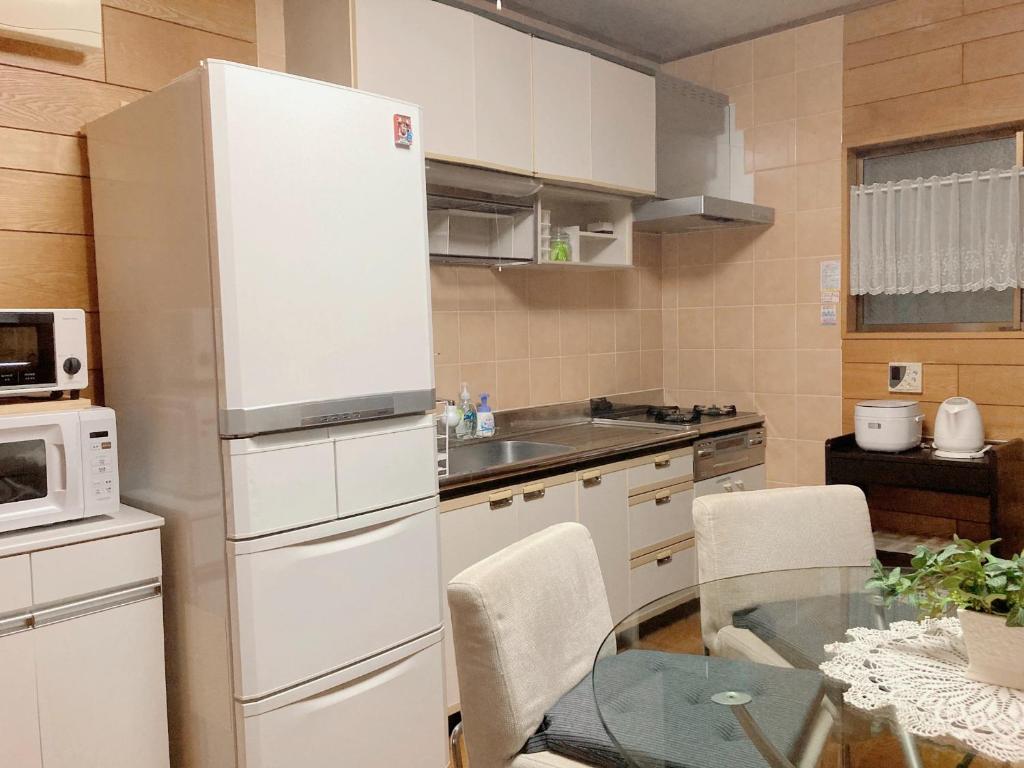Kuchyň nebo kuchyňský kout v ubytování Guesthouse cherry