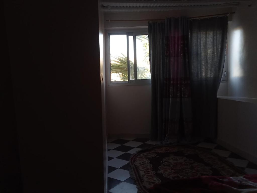 an open door to a room with a window at Hamed Guest House in Aswan
