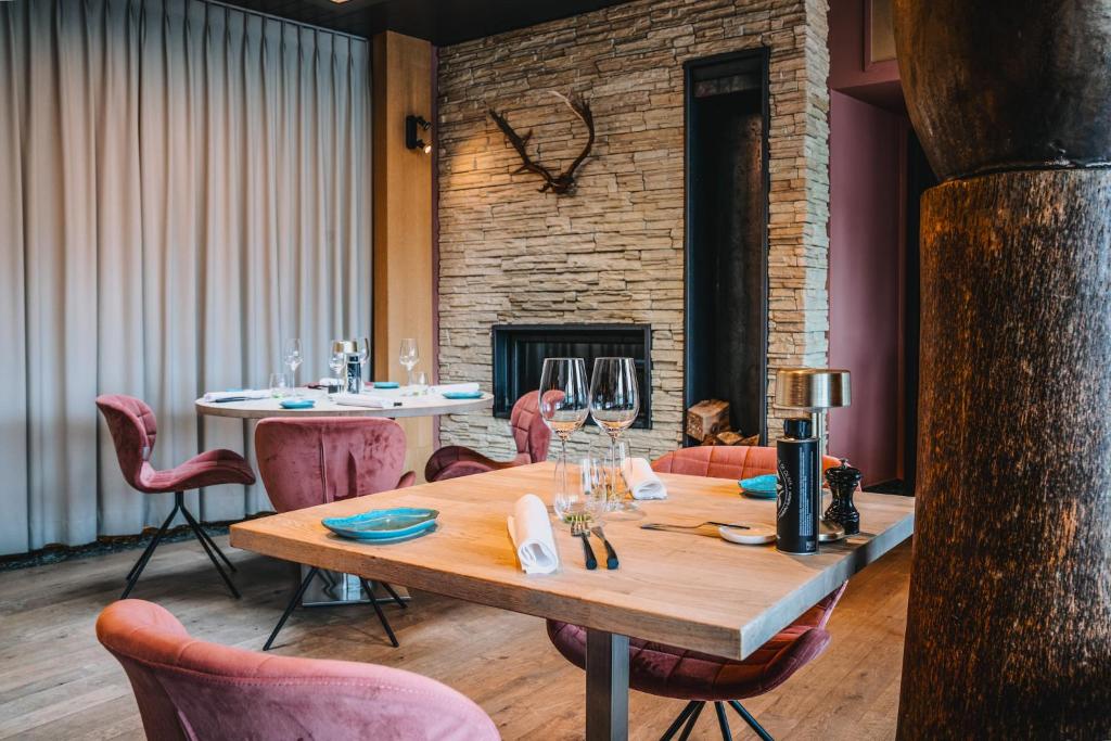 Posezení v ubytování Hotel Les Eleveurs