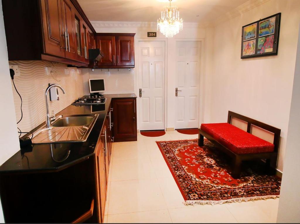 Kuchyň nebo kuchyňský kout v ubytování Windsor Residence