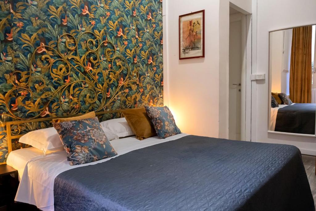 A bed or beds in a room at La residenza del Principe