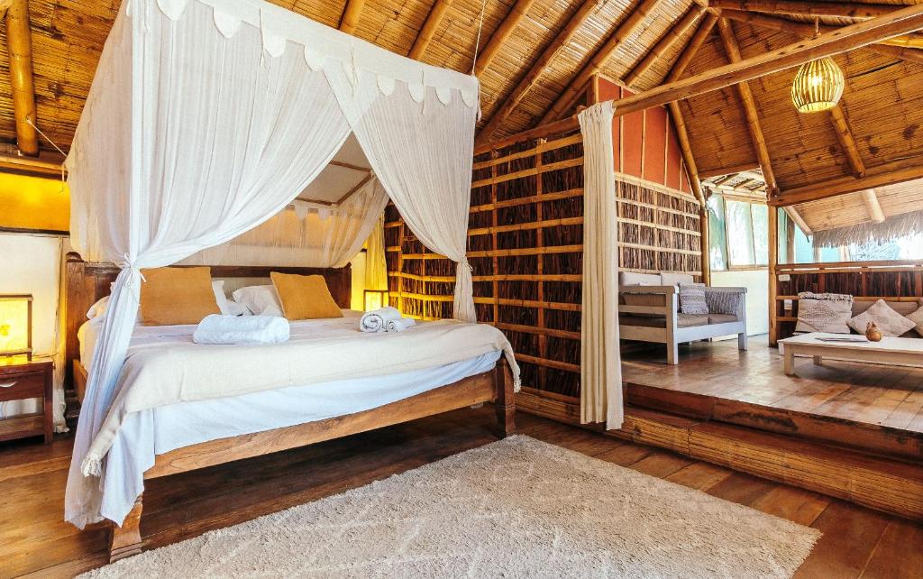 Postel nebo postele na pokoji v ubytování La Maison Eco House & Yoga