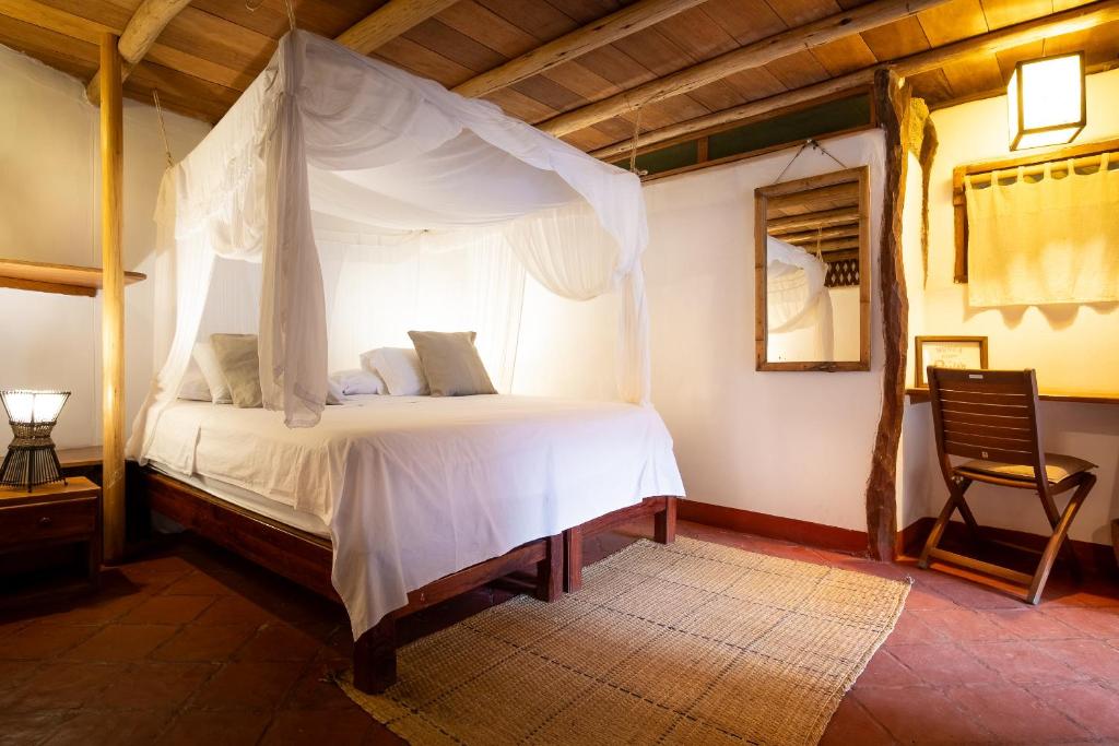 Postel nebo postele na pokoji v ubytování La Maison Eco House & Yoga