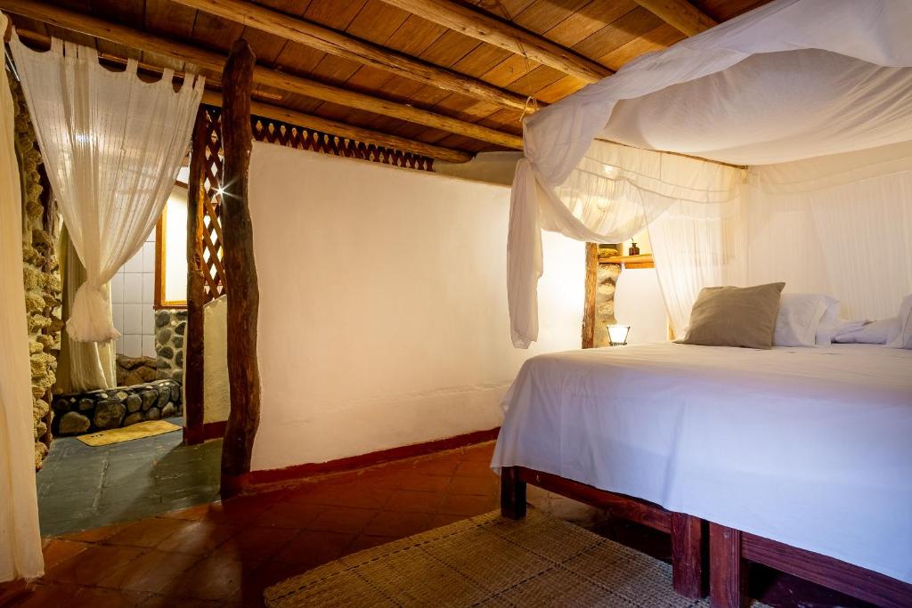 Postel nebo postele na pokoji v ubytování La Maison Eco House & Yoga