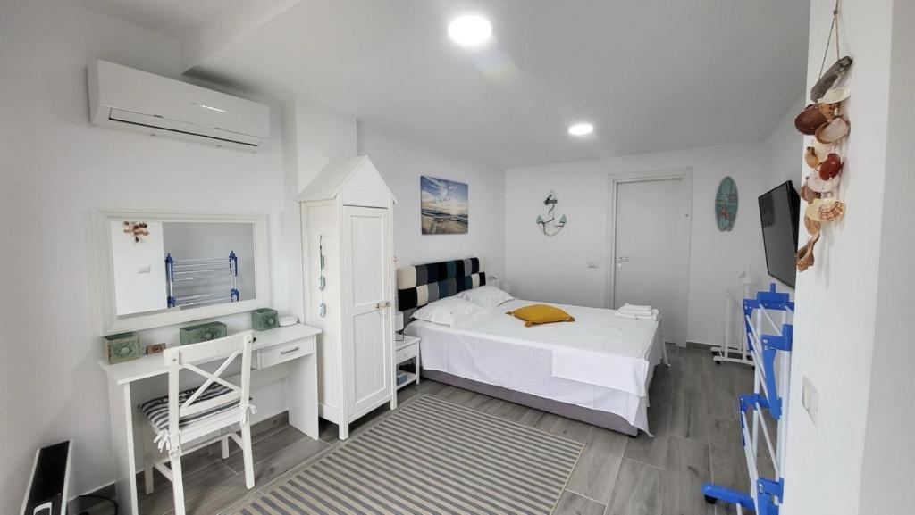 Katil atau katil-katil dalam bilik di Serenity Sea View Apartment
