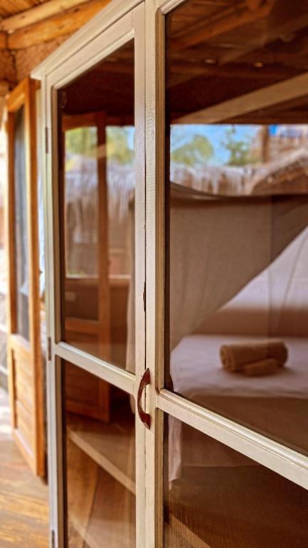 Postel nebo postele na pokoji v ubytování La Maison Eco House & Yoga