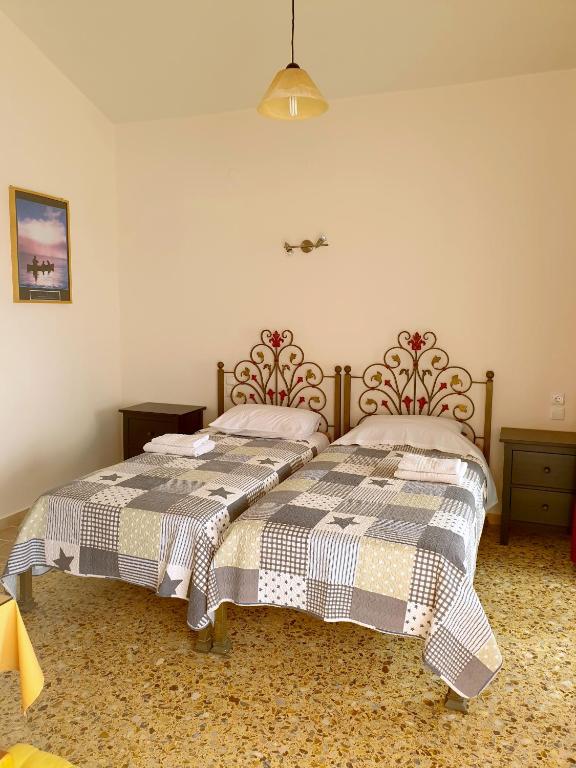 Postel nebo postele na pokoji v ubytování Filippos Apartments "Room 5" No kitchen