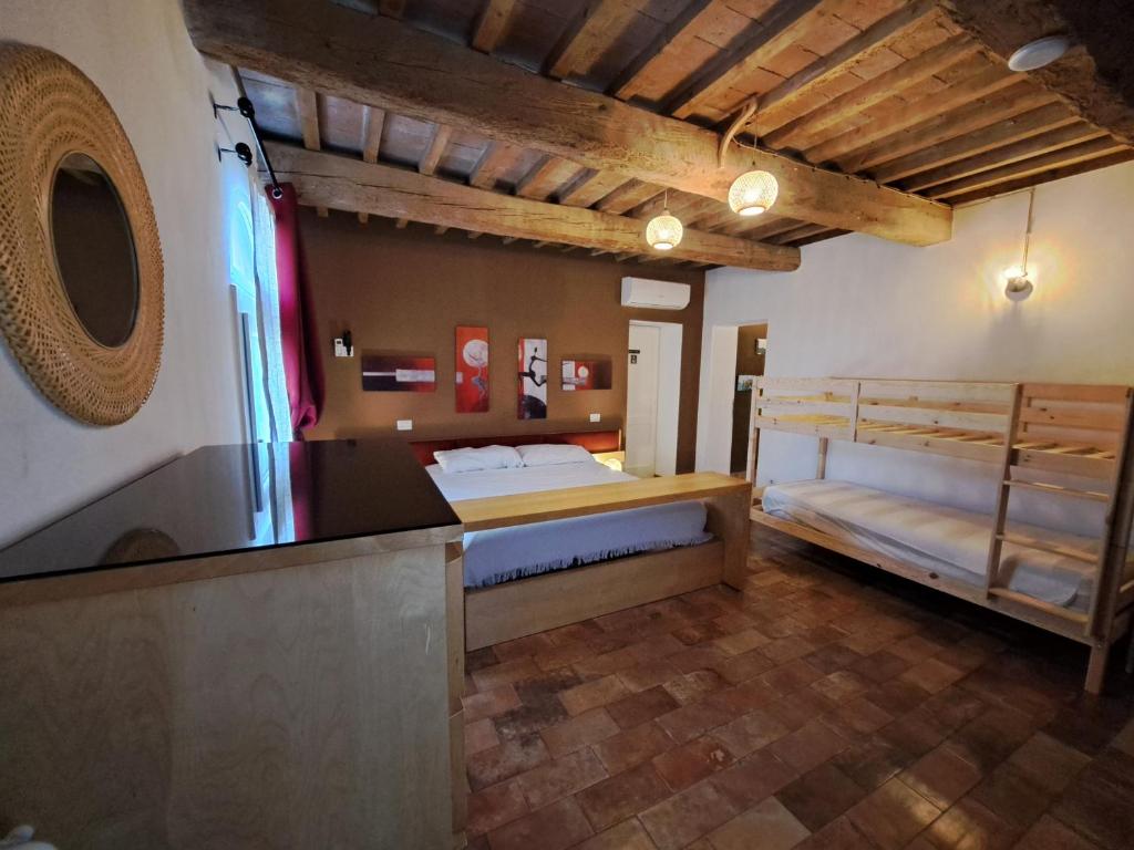Postel nebo postele na pokoji v ubytování B&B Ca Rossa