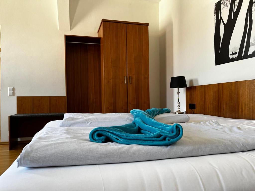 Postel nebo postele na pokoji v ubytování Landgasthof zur Sonne I Hotel & Restaurant