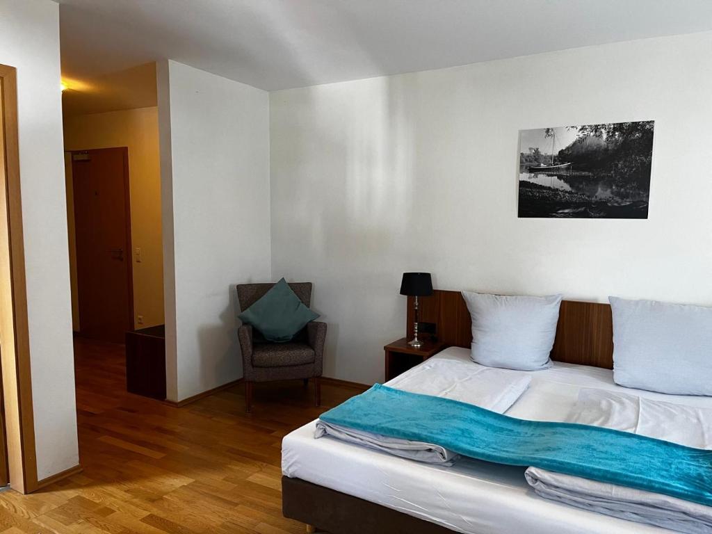 Postel nebo postele na pokoji v ubytování Landgasthof zur Sonne I Hotel & Restaurant