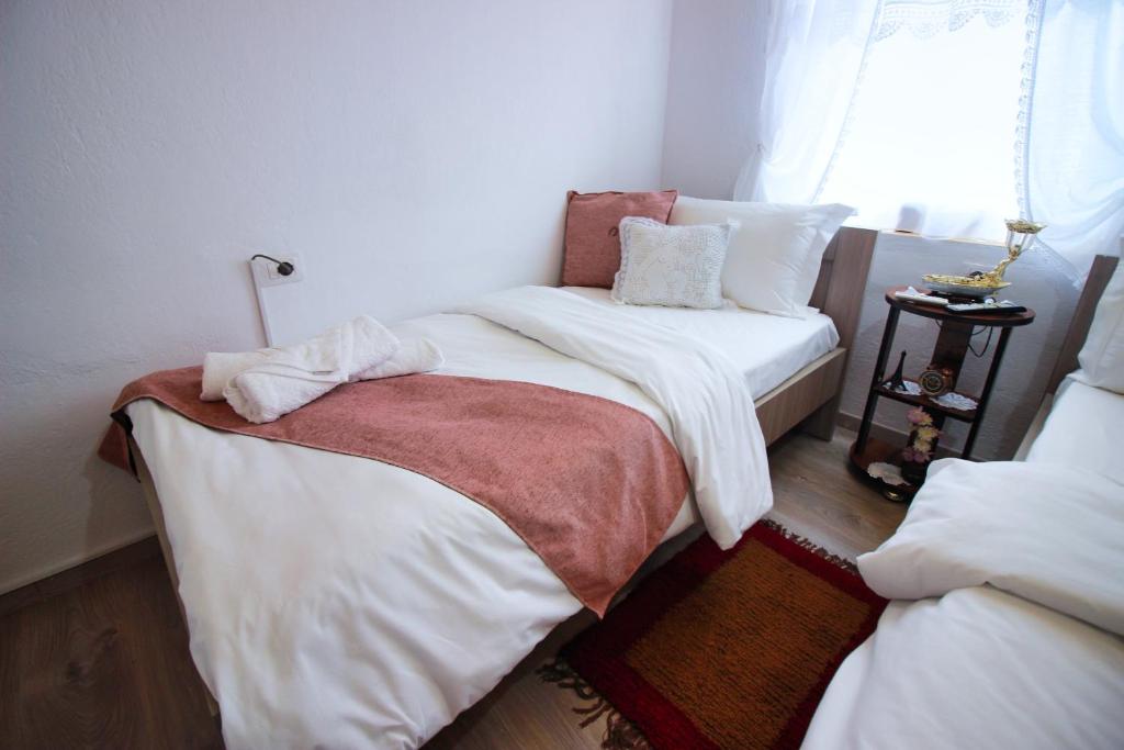 Voodi või voodid majutusasutuse Guest House Denis toas
