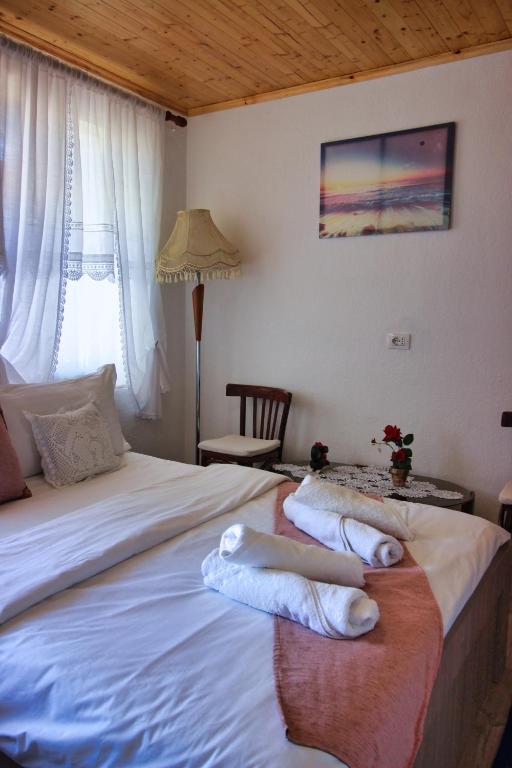 Voodi või voodid majutusasutuse Guest House Denis toas