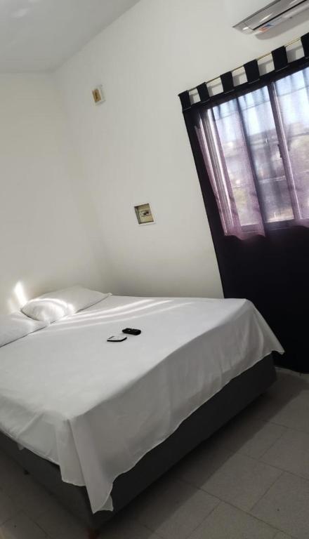 Postel nebo postele na pokoji v ubytování Apart Hotel - Eucaliptal