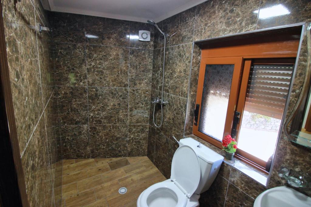 Vannituba majutusasutuses Guest House Denis