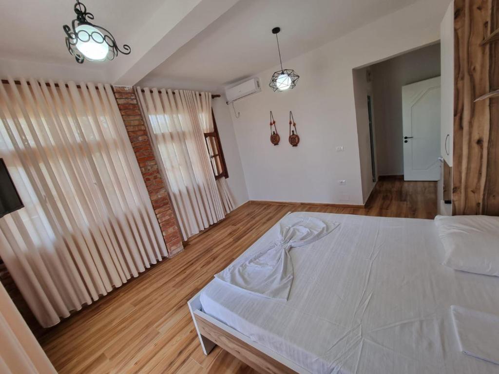 Postel nebo postele na pokoji v ubytování Vila Elin