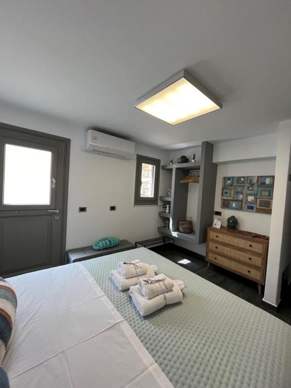Postel nebo postele na pokoji v ubytování Villa Cycladic View Syros