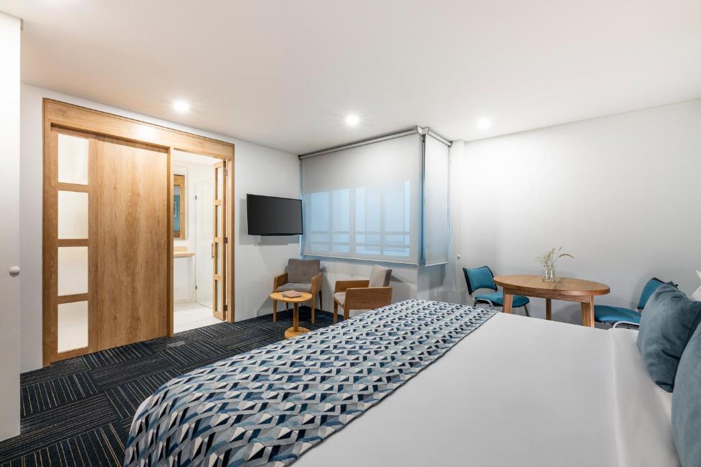 Postel nebo postele na pokoji v ubytování Hotel Camino de la Sal